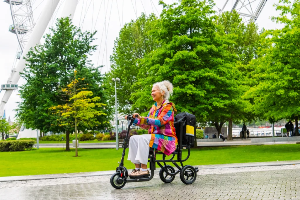 Woman enjoying a riverside outing on her eFOLDi near the London Eye
